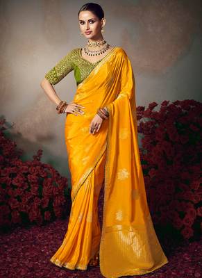 Yellow chiniya silk heavy designer embroidered saree 1