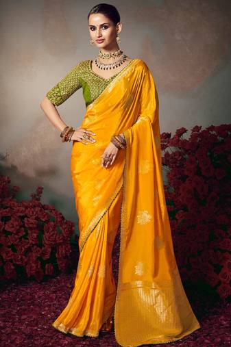 Yellow chiniya silk heavy designer embroidered saree