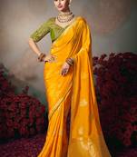 Yellow chiniya silk heavy designer embroidered saree