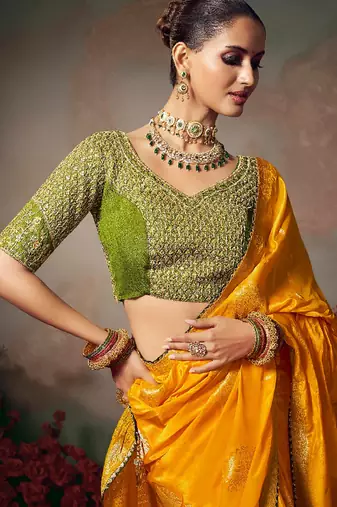 Yellow chiniya silk heavy designer embroidered saree