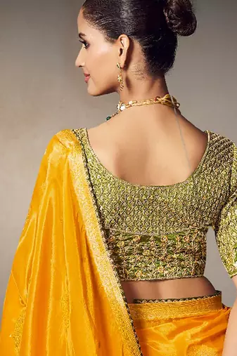 Yellow chiniya silk heavy designer embroidered saree