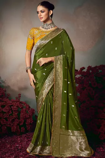 Dark green chiniya silk heavy designer embroidered saree