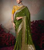 Dark green chiniya silk heavy designer embroidered saree