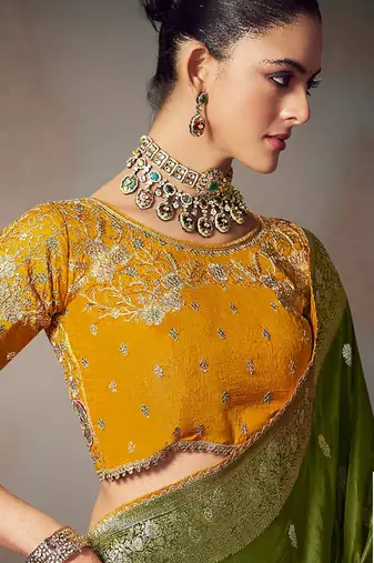 Dark green chiniya silk heavy designer embroidered saree