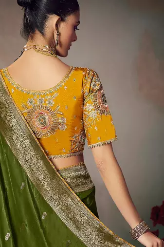 Dark green chiniya silk heavy designer embroidered saree