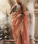 Peach and blue multi embroidered tissue silk saree