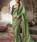 Green golden multi embroidered tissue silk saree