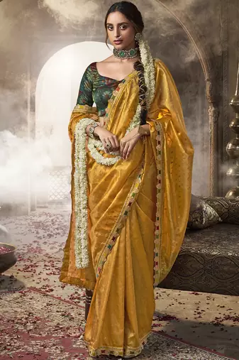 Yellow multi embroidered tissue silk saree