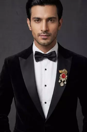 Luxury panther motif gold plated brooch with red stone & kundan drops     designer  pin for women & men