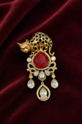 Luxury panther motif gold plated brooch with red stone & kundan drops     designer  pin for women & men