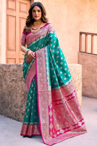 Turquoise silk zari woven saree with blouse