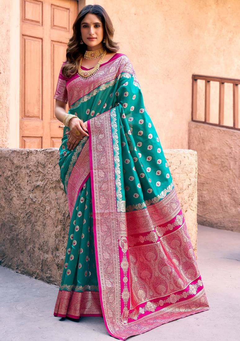 Turquoise silk zari woven saree with blouse