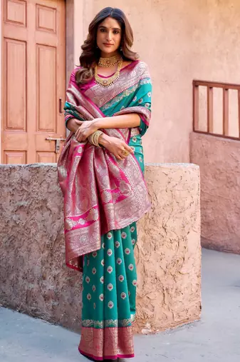 Turquoise silk zari woven saree with blouse