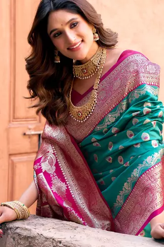 Turquoise silk zari woven saree with blouse