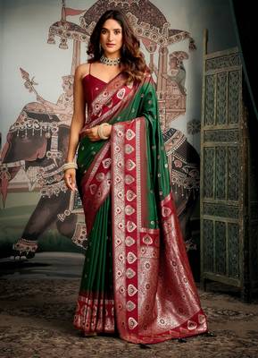 bottle green festive wear zari woven soft silk saree 1