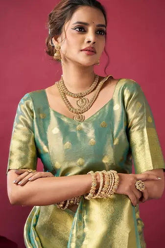 golden green tissue silk zari woven saree