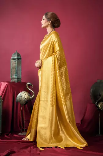 Mustard tissue silk zari woven saree with blouse