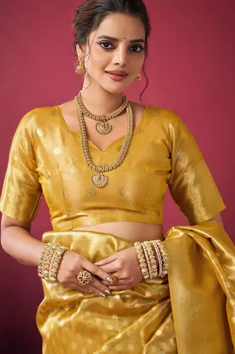 Mustard tissue silk zari woven saree with blouse
