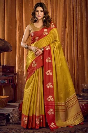 Parrot green soft tissue zari woven saree with blouse