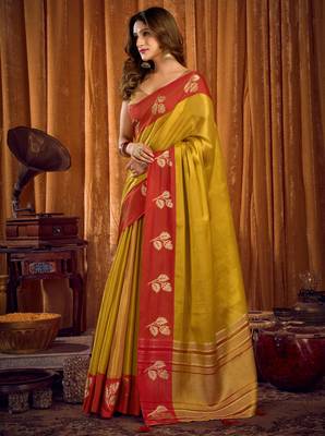parrot green soft tissue zari woven saree for festive wear 3