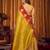 Parrot green soft tissue zari woven saree with blouse