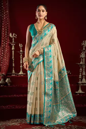 Off white modal banarasi zari woven saree with blouse