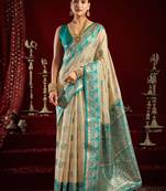 Off white modal banarasi zari woven saree with blouse