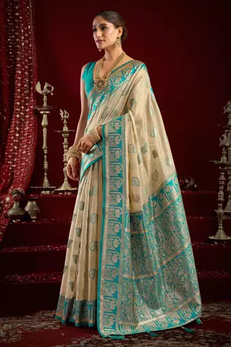 Off white modal banarasi zari woven saree with blouse