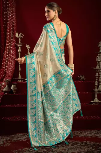 Off white modal banarasi zari woven saree with blouse