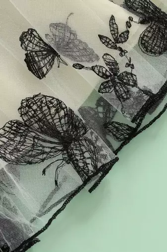 Black & cream butterfly print net party wear fit & flare dress for girls