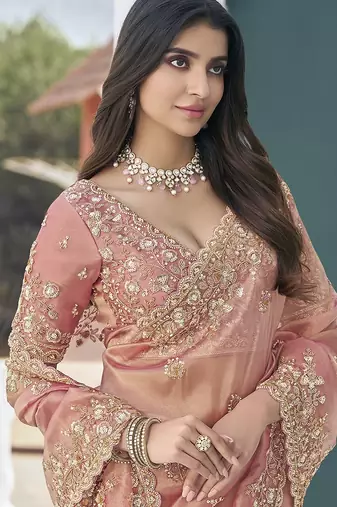 Peach embroidered tissue wedding saree with premium embroidered blouse fabric
