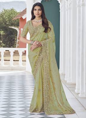 Green embroidered tissue wedding saree with premium embroidered blouse fabric 1