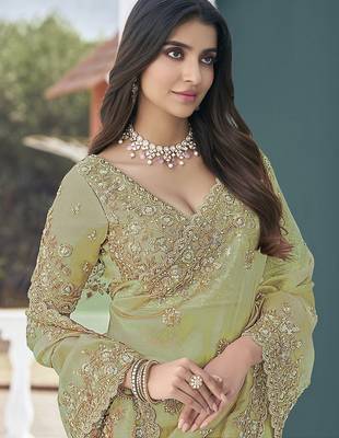 Green embroidered tissue wedding saree with premium embroidered blouse fabric 2