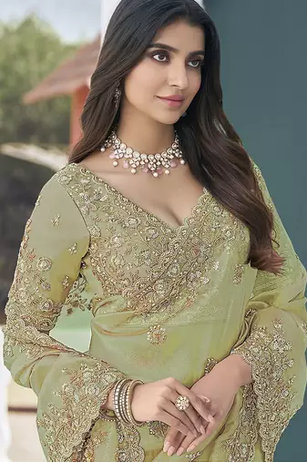 Green embroidered tissue wedding saree with premium embroidered blouse fabric