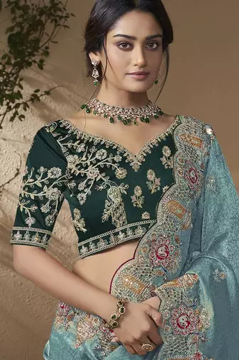 Sky blue embroidered viscose wedding saree with premium embroidered blouse fabric