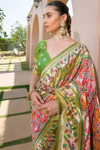 green silk blend floral paithani woven saree