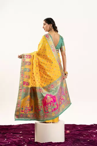 yellow banarasi meena work silk saree