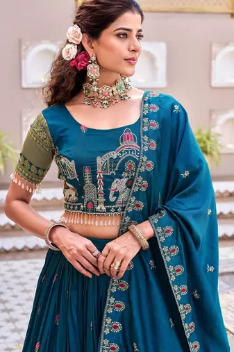 teal thread work embroidered silk lehenga set