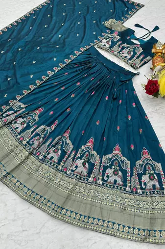teal thread work embroidered silk lehenga set
