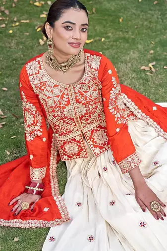 orange sequin and thread work silk lehenga set