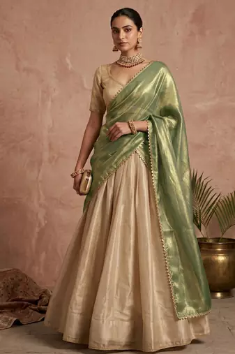 beige wedding lehenga with sweetheart neck blouse