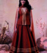 Rust Orange Lase Work Circular Lehenga with Deep V Neck long Blouse