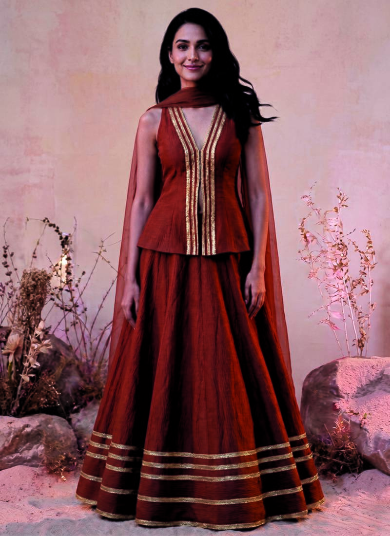 Rust Orange Lase Work Circular Lehenga with Deep V Neck long Blouse