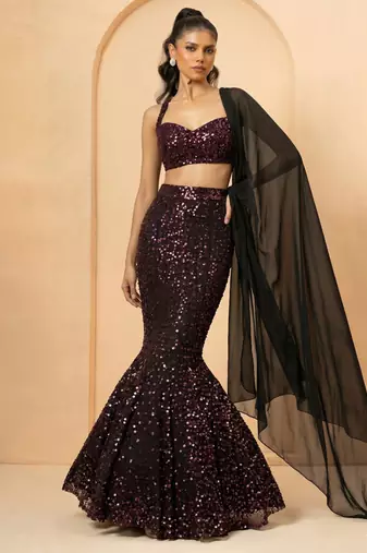 red and black sequin mermaid cut partywear lehenga with sweetheart neck blouse