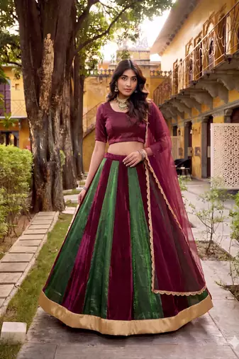 green and maroon  traditional kali  lehenga with lace work