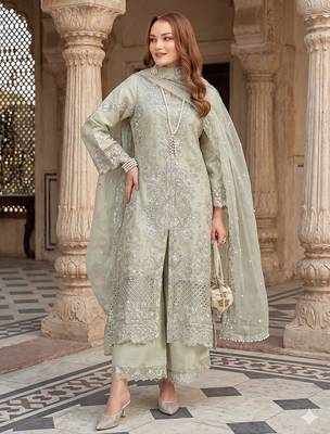 Womens new net with heavy embroiedery with sequence work kurta set 1