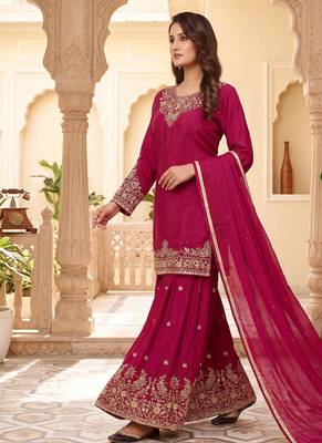 Womens rani pink embroidered sharara suit with golden zari work and chiffon dupatta 1
