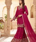 Womens elegant rani pink embroidered sharara suit with golden zari work and chiffon dupatta