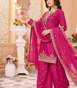 Womens silk embroidered sharara suit with golden zari work and lace border dupatta