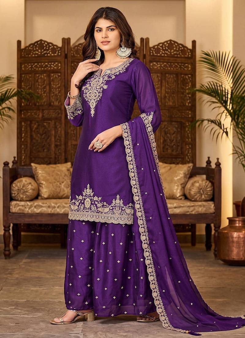 Womens new stylish silk embroidered sharara suit with golden zari work and lace border dupatta